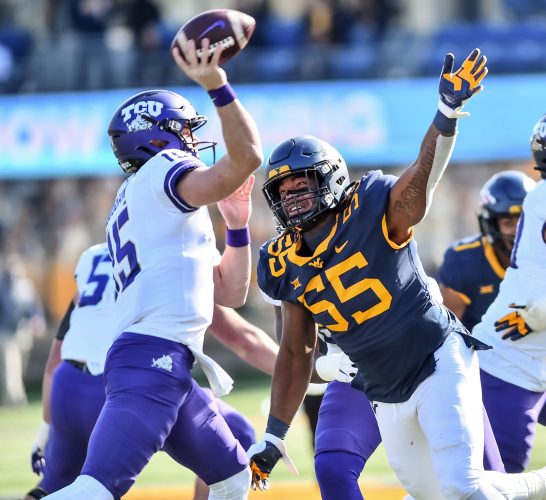 Jarrett Doege Throws 2 TDs, WVU Runs Over TCU, 24-6